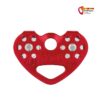 Rote Petzl Tandem Doppelseilrolle vor weißem Hintergrund.