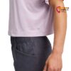 Lila Black Diamond Womans Circuit Short Sleeve Tee über dunkler Hose an einem Modell.