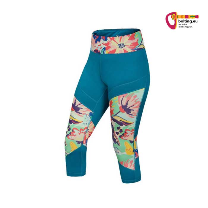 Blaue Ocun Rhea 3/4 Kletterleggings von der Seite vor weißem Hintergrund.