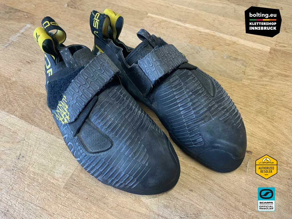 Ein schwarzes Paar La Sportiva Ondra Comp nach dem No Edge Resoling Service im Klettershop Innsbruck.